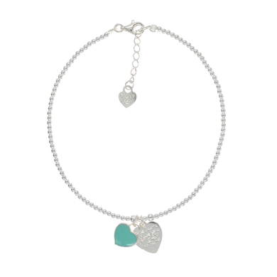 Sterling silver anklet with resin aqua heart, heart charm, and adjustable fit.