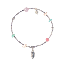 Sterling silver charm bracelet with turquoise and coral beads, surfboard charm