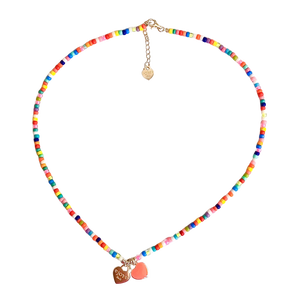 Colorful beaded necklace with heart-shaped charms on a white background