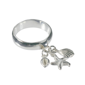 Silver ring with starfish and shell charms on a white background