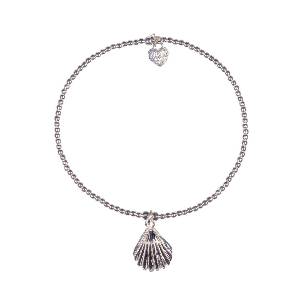 A bracelet made of 925 sterling silver beads with a small shell charm, displayed against a white background.